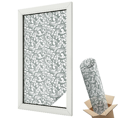 Dekoracyjna folia okienna Stylizowane liście na szarym tle