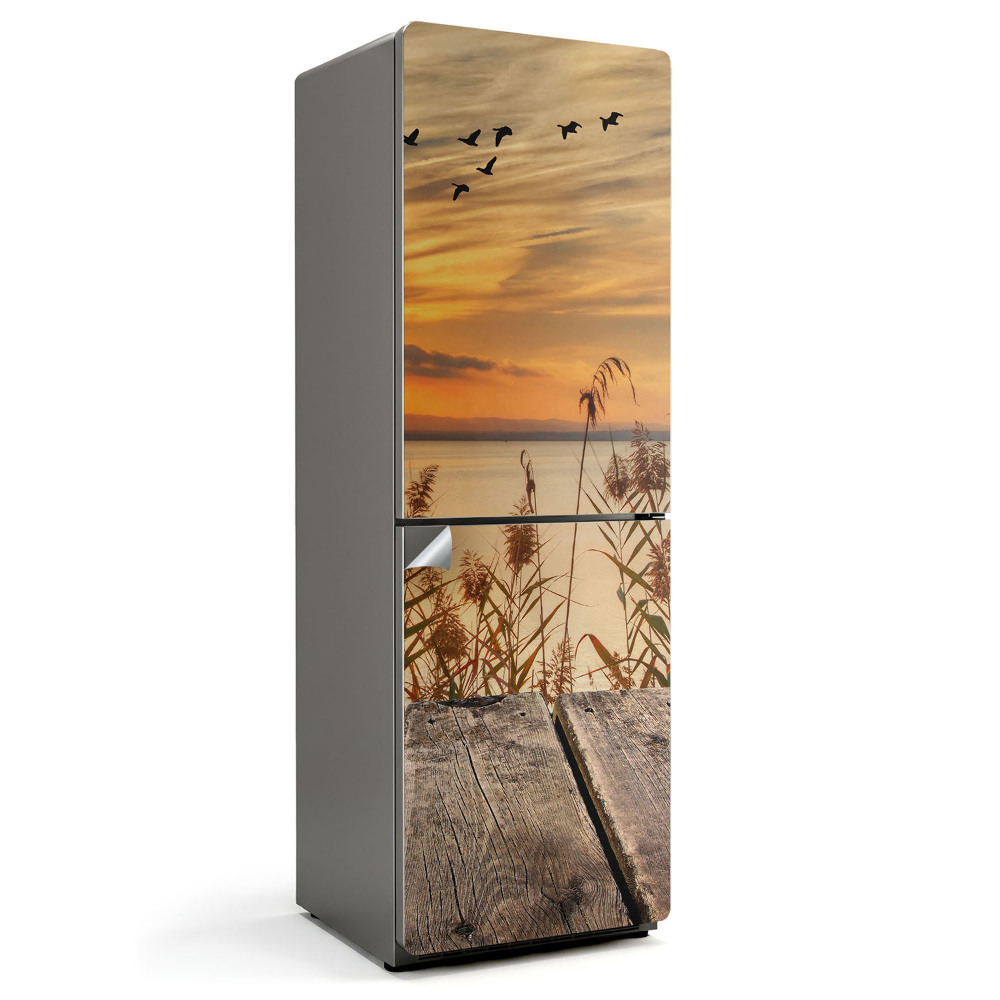 Okleina na lodówkę Zachód słońca nad wodą