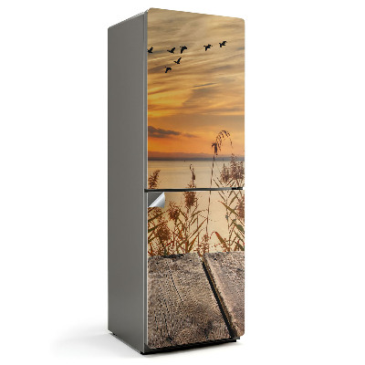 Okleina na lodówkę Zachód słońca nad wodą