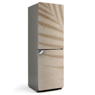 Naklejka na lodówkę Cień liści na tle piasku